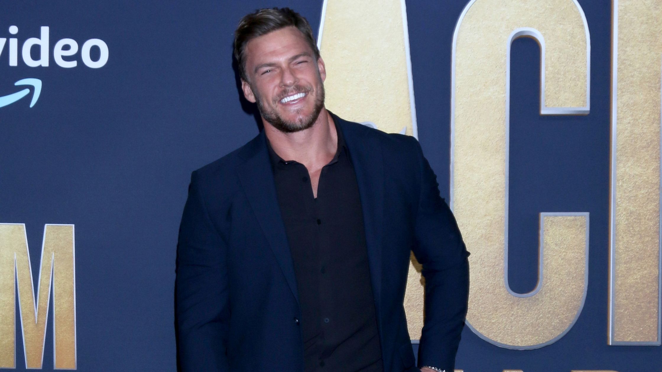LAS VEGAS - MAR 7: Alan Ritchson at the 2022 Academy of Country Music Awards Arrivals at Allegient Stadium on March 7, 2022 in Las Vegas, NV (Kathy Hutchins / Shutterstock)